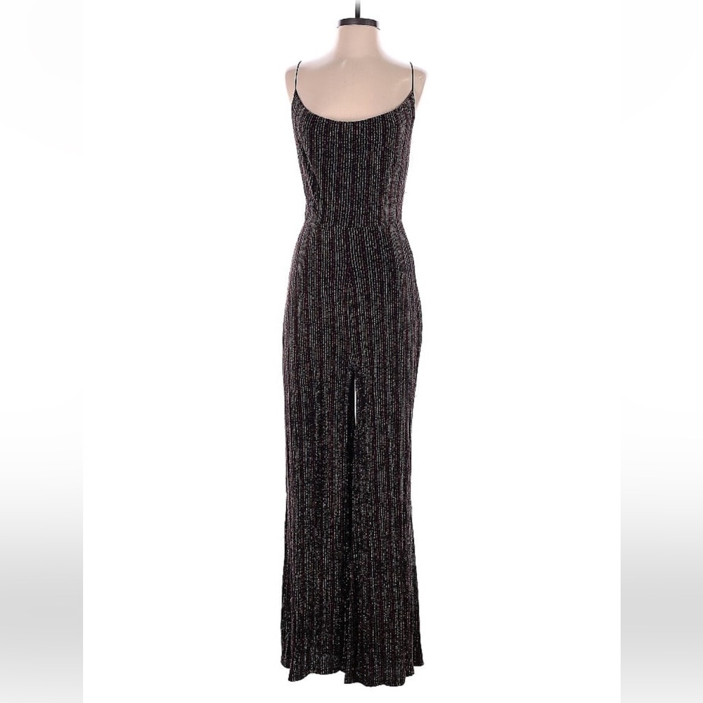 Beautiful NWT Anthropologie stretch jumpsuit with draped neckline in metallic